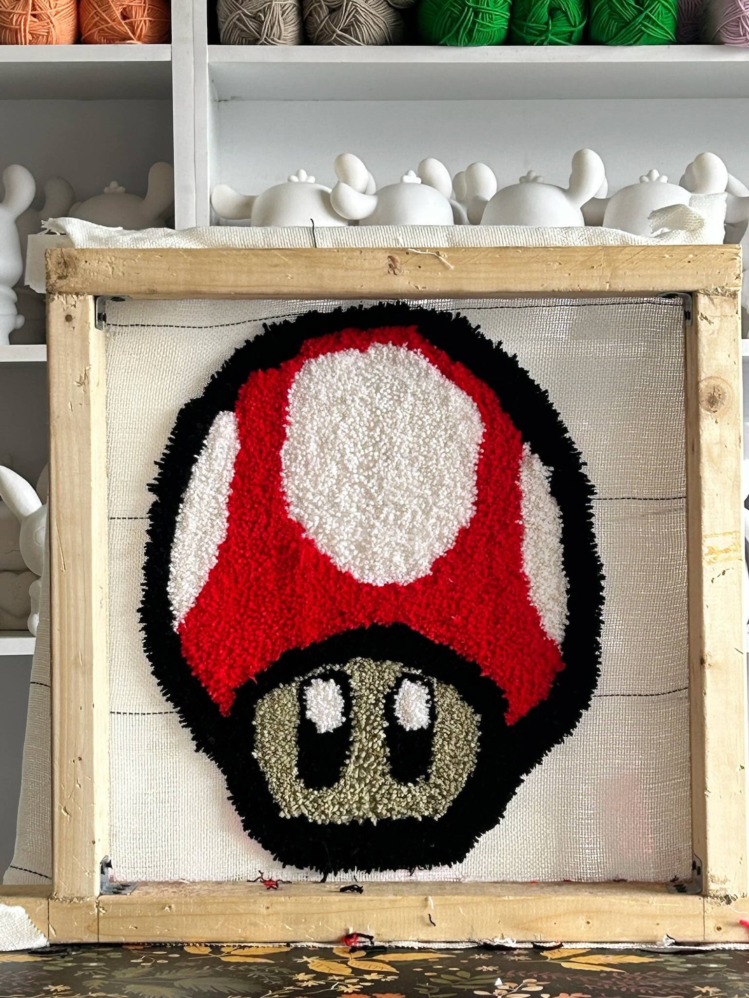 Finished custom tufted rug on the frame at Splashit
